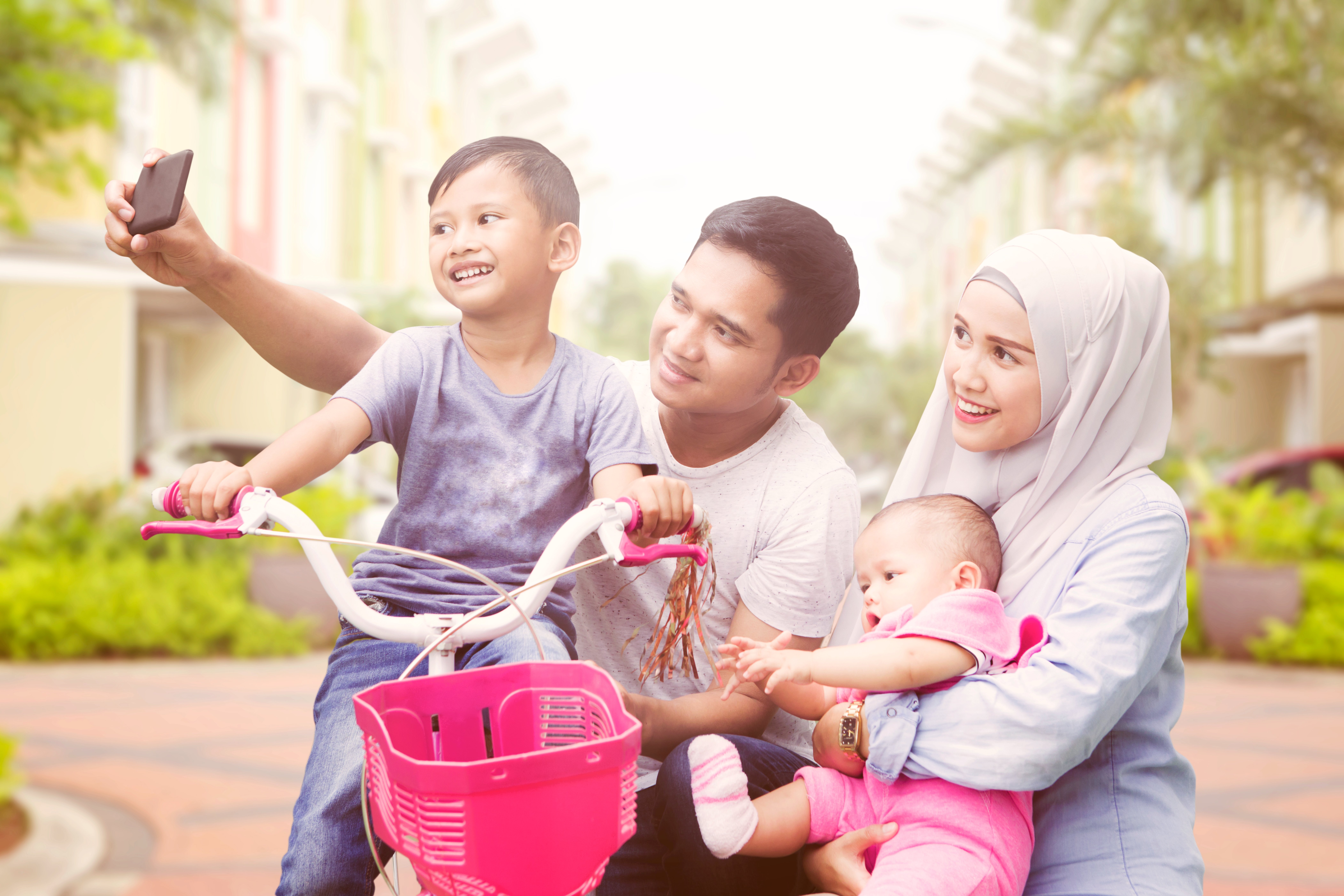 Happy muslim family taking selfie spending quality time