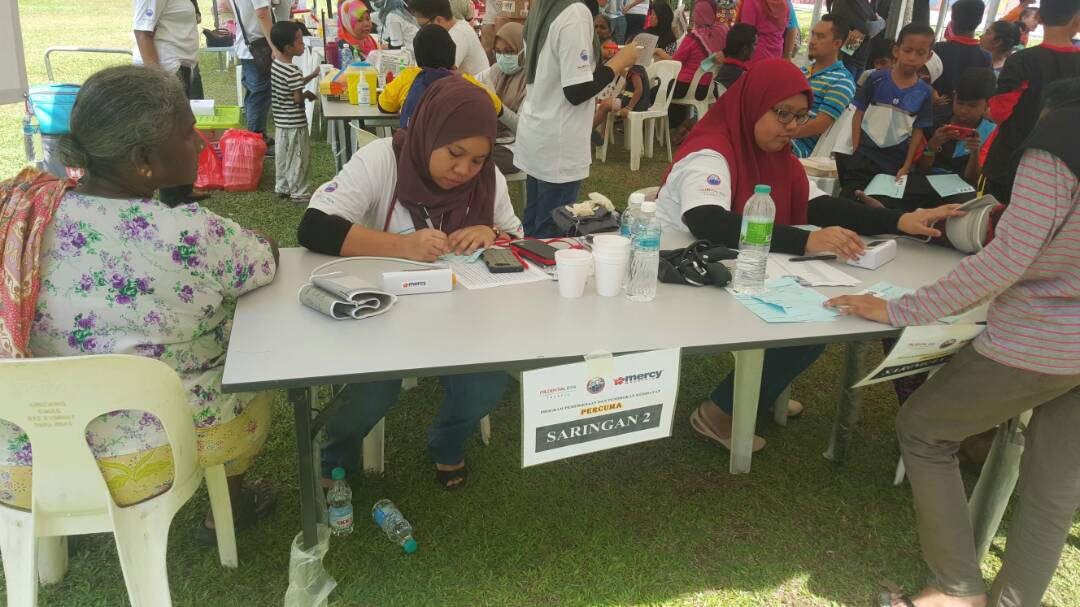 A photo of people doing check ups