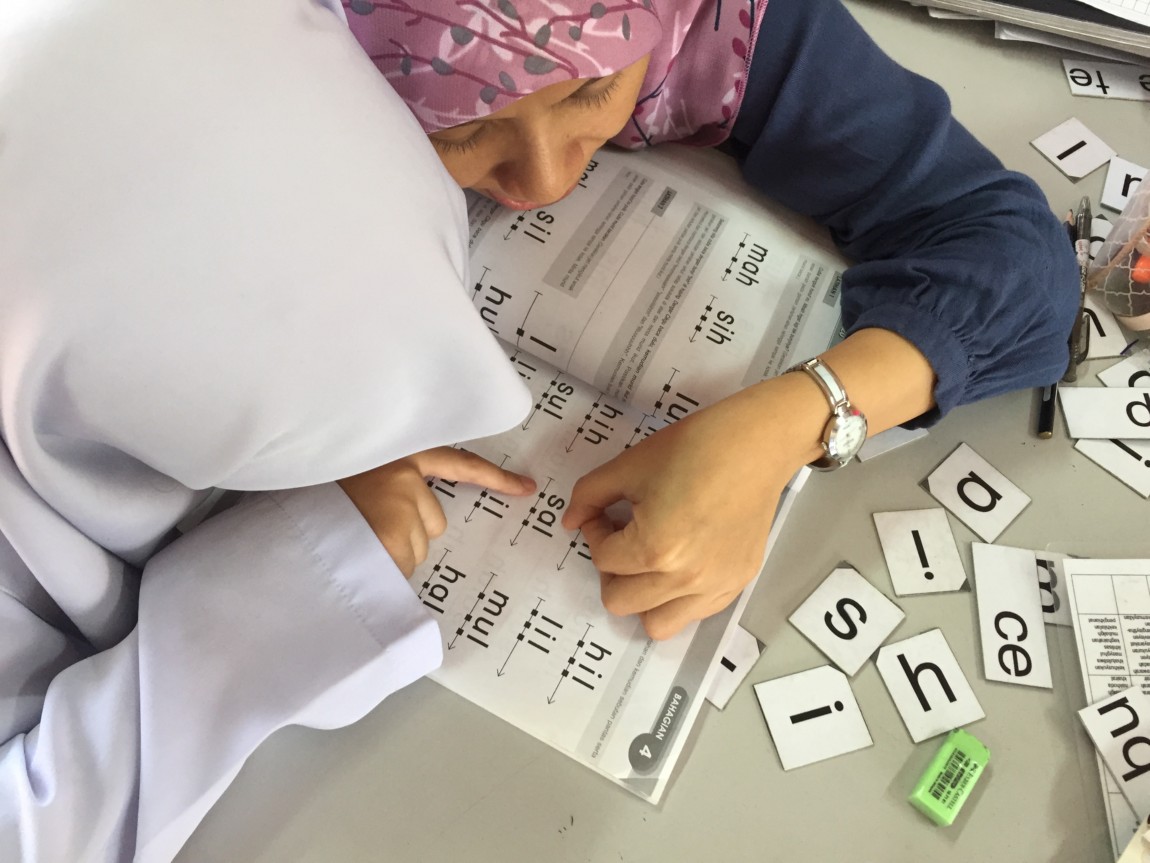 Two children studying