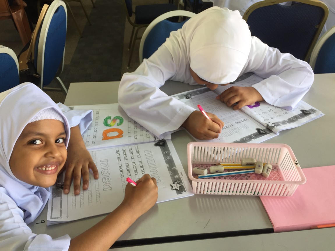 Two children studying