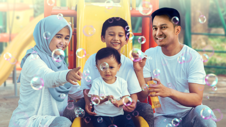 Family playing bubble