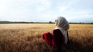 A mother touching her daughter’s cheek
